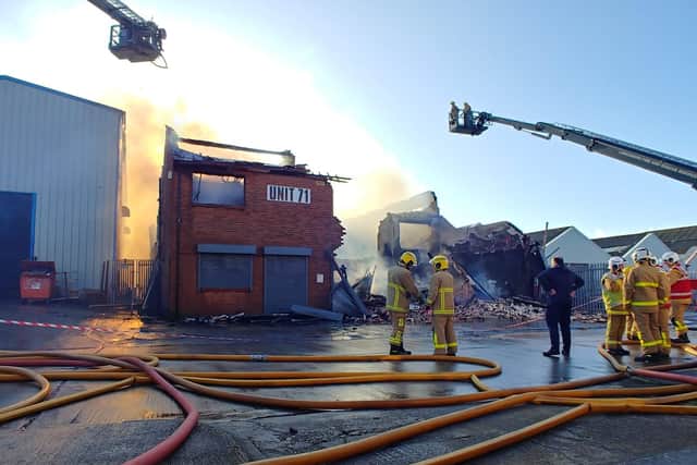 The building partly collapsed after being ravaged by fire this morning