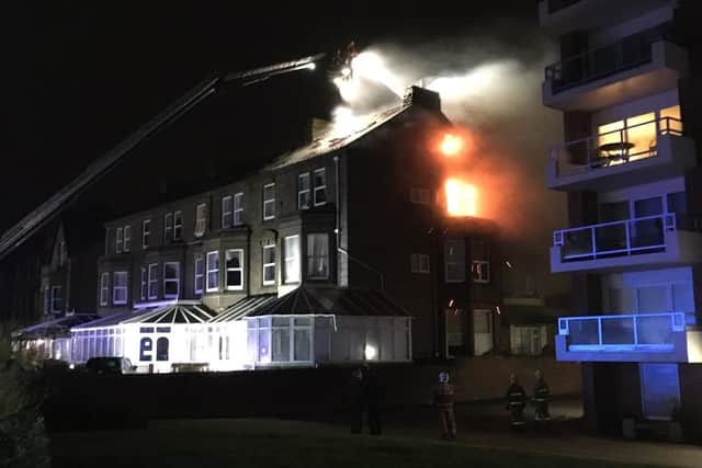Ten fire engines and two Aerial Ladder Platforms have been tackling the flat fire in North Promenade over night. Pic: LFRS