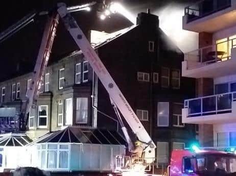 Firefighting efforts continued through the night to prevent the blaze spreading to a neighbouring hotel