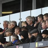 Joey Barton (back row, third from right) will be back in the dugout at Portsmouth tonight after completing his touchline ban on Saturday
