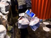 Couriers are classed as self-employed and are not usually entitled to statutory sickness or holiday pay (Pic:CHANDAN KHANNA/AFP via Getty Images)