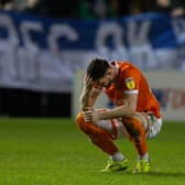 James Husband can't hide his disappointment at the full-time whistle