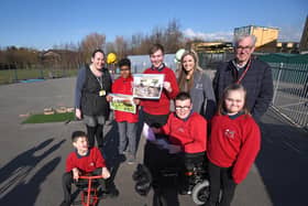 Staff and pupils from Red Marsh Special School with Nigel Law, chairman of Swallowdale Children's Trust