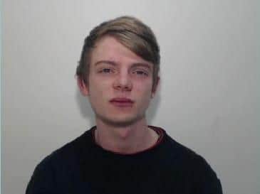Cameron Couper (photo taken in 2018) is described as 5ft 7in tall, of slim build, with blonde hair usually worn in a top knot, but this may have recently beencut off. (Credit: Lancashire Police)