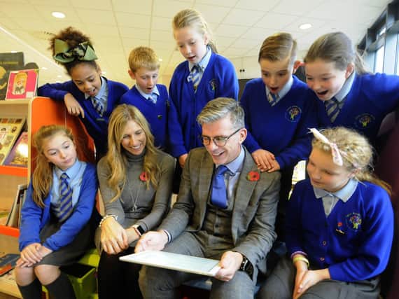 Pupils at Layton Primary School with assistant headteacher Claire Jones and headteacher Jonathan Clucas