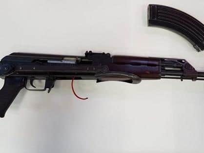 A 30-year-old man from Blackpool has been charged with seven offences following the seizure of an Kalashnikov rifle and a 9mm hand gun, as well as over 200 rounds of ammunition and cannabis. Pic: NCA