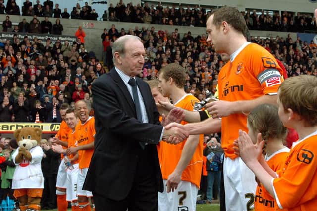 Armfield shakes the hand of Pool captain Charlie Adam as he's given a guard of honour