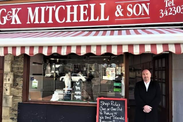 Colin Appleby helping out on the door at GK Mitchell and Son butchers in Lytham Road, Blackpool
