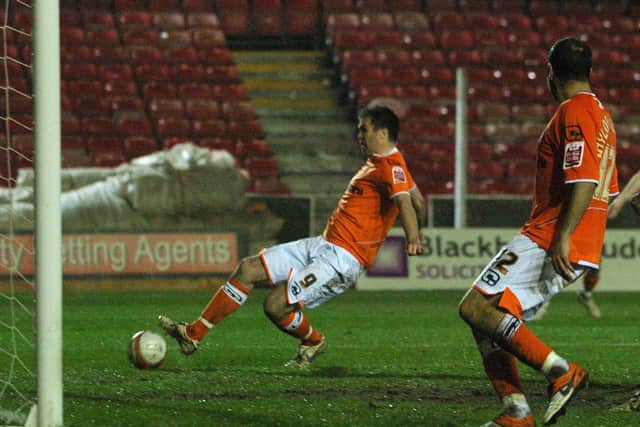 Ben Burgess bundles home at the back post