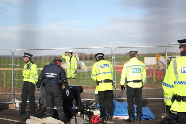 Police removing locked-on protesters at the Preston New Road fracking site at the height of the protests before a halt on fracking was announced by the Government in November 2019