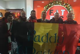 The Belgian fans who visited Fleetwood Town were greeted by chairman Andy Pilley (centre) and their hero Paddy Madden (far right)