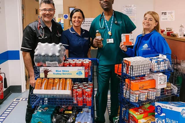 Blue Skies' Kila Redfearn with staff from Blackpool Victoria Hospital with donations made by local communities. (Photo taken before social distancing guidelines issued)
