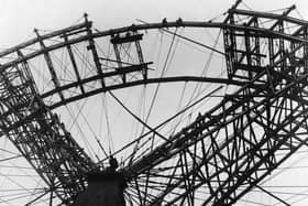 The final sections of the Big Wheel are put in place in 1895