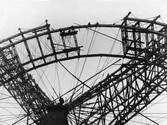 The final sections of the Big Wheel are put in place in 1895