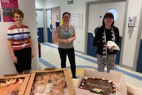 Clifton Hospital secretaries Ros Tillbrook, Sheryl Ormand and Lynne Reynolds with cakes donated to the hospital by Pam and Mike Young