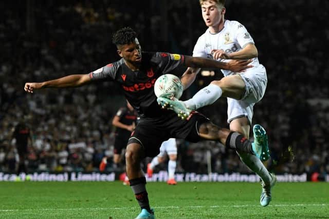 Leif Davis (right) in action for Leeds United against Stoke City in this season's Carabao Cup