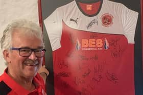 Michael Wright treasures his signed Fleetwood Town shirt