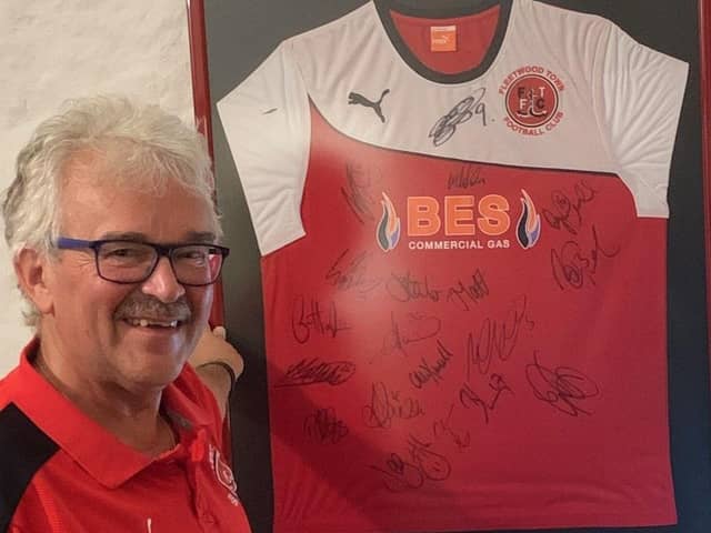 Michael Wright treasures his signed Fleetwood Town shirt