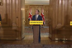 Chief Medical Officer Chris Whitty and Chief Scientific Adviser Sir Patrick Vallance joined Foreign Secretary Dominic Raab during a media briefing in Downing Street, London