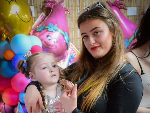 Single mum Courtney Howarth fears her five-year-old daughter Esm who has up to 150 fits a day could die of an infection as she struggles to get access to essential items for her care.