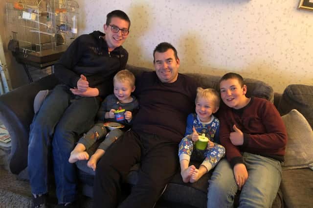 Stephen Betteridge back at home with children from left: Nathan 14, Declan, 12, and twins, Logan and Kieran, both four