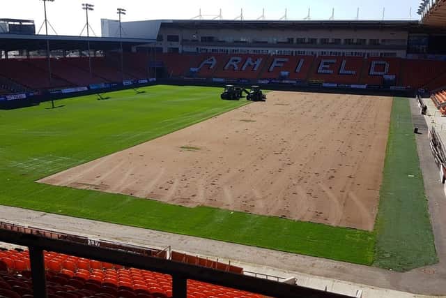 Blackpool's grounds team have started major renovation work on the Bloomfield Road pitch
