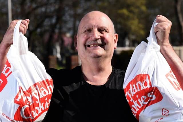 Bernie Glen of Burton's Biscuits has been handing out bags of biscuits to neighbours and worthy folk to keep spirits up in the coronavirus crisis