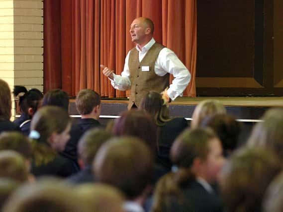 Ian Holloway addressing a school assembly at Palatine ahead of Blackpool's vital game against Peterborough United in 2010