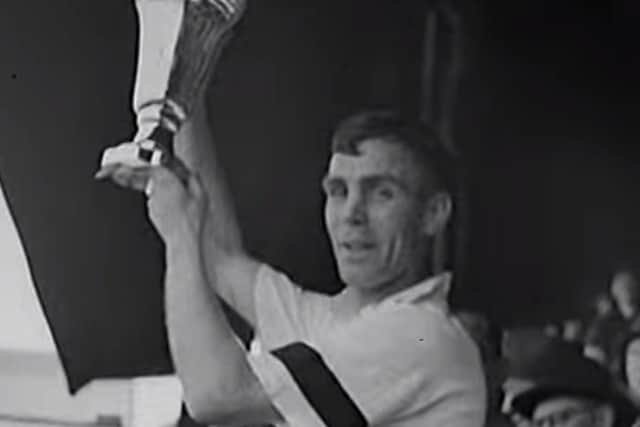 Tom Smith lifting the war cup for Preston North End in 1941