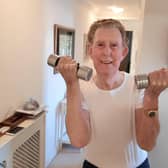 Bill Dobie keeps fit in his pop-up gym at home in St Annes
