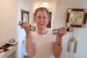 Bill Dobie keeps fit in his pop-up gym at home in St Annes