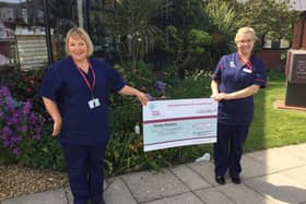 Receiving the cheque from Blackhurst Budd are Clinical Director Nicky Parkes  (left) and Ward Manager Cathy Whittaker at Trinity Hospice