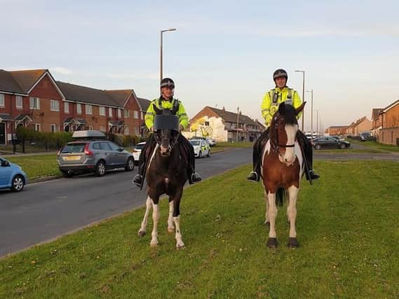Mounted police in Fleetwood as the force steps up its presence over increased tension between two groups