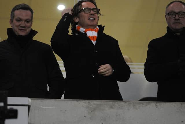Simon Sadler's (centre) ambitions as Blackpool owner have been put on hold due to the pandemic