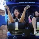 Thrill seekers try out the new Infusion rollercoaster ride at Blackpool Pleasure Beach on 1 May, 2007 (Photo by Christopher Furlong/Getty Images)