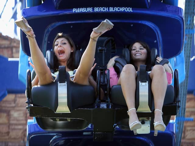 Thrill seekers try out the new Infusion rollercoaster ride at Blackpool Pleasure Beach on 1 May, 2007 (Photo by Christopher Furlong/Getty Images)