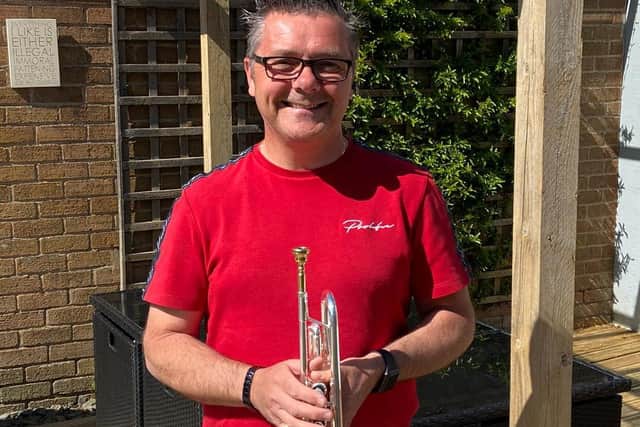 Mark Holt stands outside his Byfield Avenue home every week to play his trumpet and show his gratitude to care workers during the coronavirus pandemic. (Photo: Mark Holt)