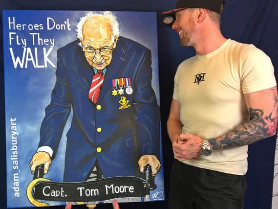 Adam Salisbury with his completed artwork of Captain Tom Moore