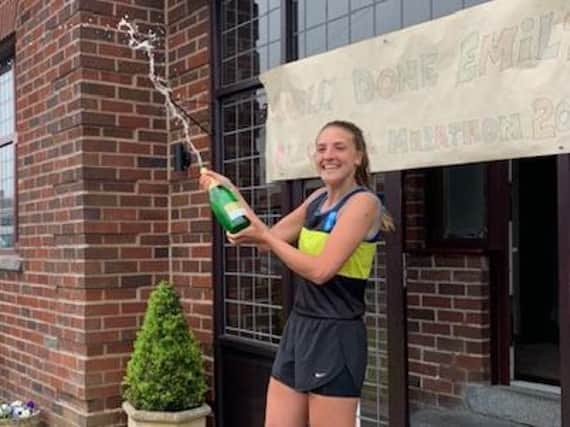 Emily Dickson celebrates in style after running 26.5 miles