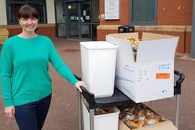 Liz Hill, a science technician at Lytham St Annes High School, with goggles donated to the NHS by the school from its science department