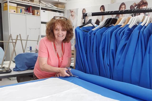Audrey Hindle at work on the gowns for Blackpool Victoria Hospital