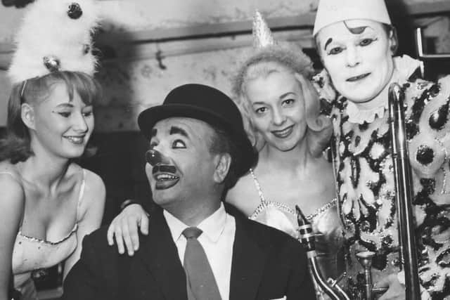 Charlie Cairoli with saxophone and Tower Circus entertainers