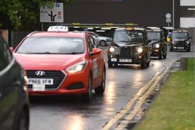 Taxi drivers from different firms passed the hospital on Thursday evening