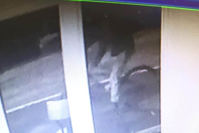 A CCTV image of a man on a mountain bike who is wanted in connection with the fire - Credit: Farmer Parrs Animal World