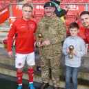 Simon Mellor and son Jack pictured earlier this year with Kyle Dempsey and Lewie Coyle
