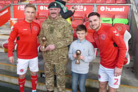 Simon Mellor and son Jack pictured earlier this year with Kyle Dempsey and Lewie Coyle