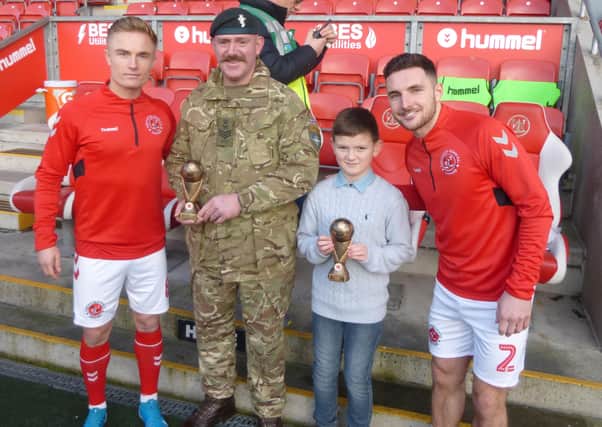 Simon Mellor and son Jack pictured earlier this year with Kyle Dempsey and Lewie Coyle
