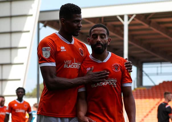 Michael Nottingham (left) hopes he has a future under Neil Critchley at Blackpool
