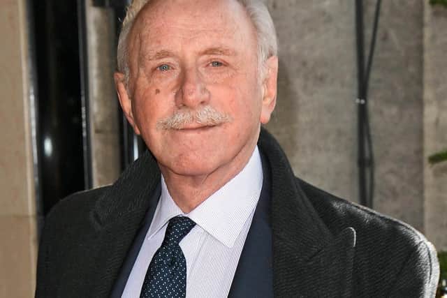 John Lyons plays priest and amateur detective Father Brown.