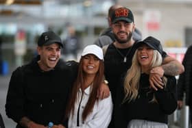 Love Island contestants, (couples left to right) Luke Mabbott and Demi Jones and winners, Finley Tapp and Paige Turley, after arriving at Heathrow Airport in London following the final of the reality TV show in 2020